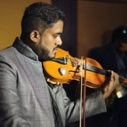 https://test.rainbowbridgeschool.com/wp-content/uploads/2024/12/Adrew-violin-faculty-rainbowbridge-bangalore-1.jpeg