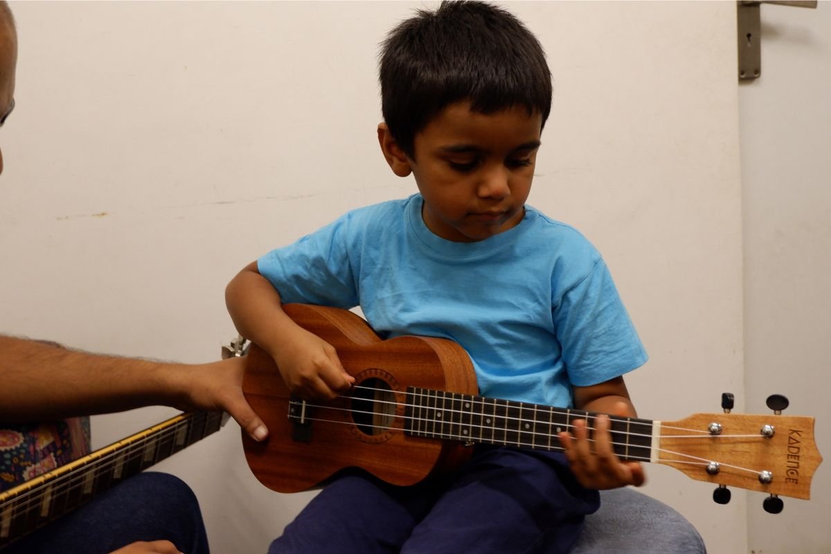 https://test.rainbowbridgeschool.com/wp-content/uploads/2024/12/ukulele-classes-bangalore.jpg